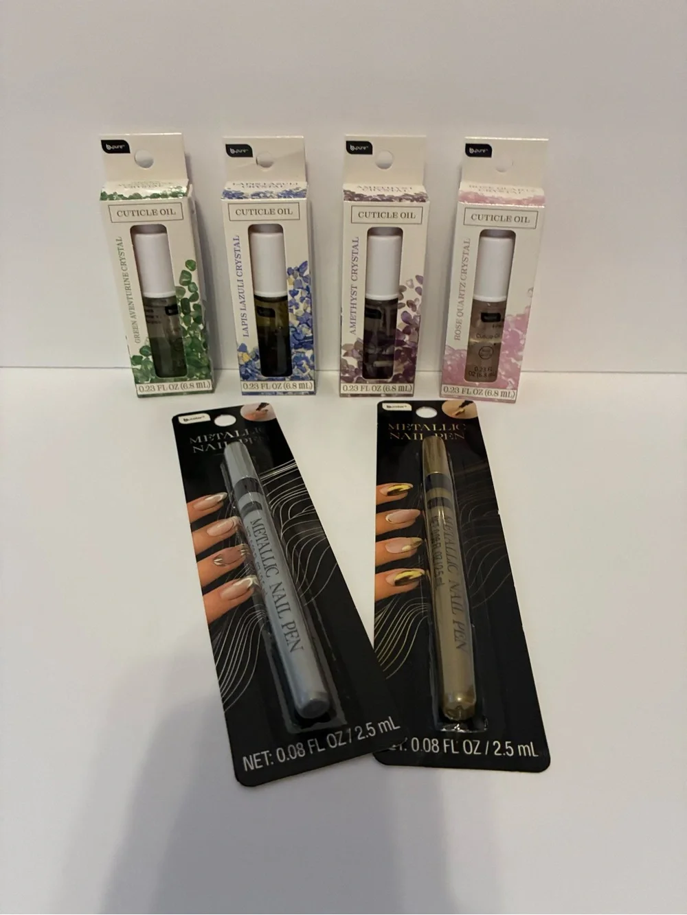 b.Pure Crystals Cuticle Oil & Metallic Nail pens  bundle